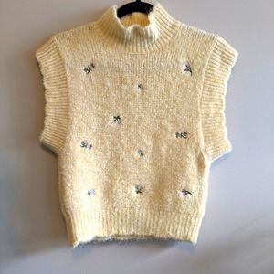 Pastel yellow sweater vest from Zara